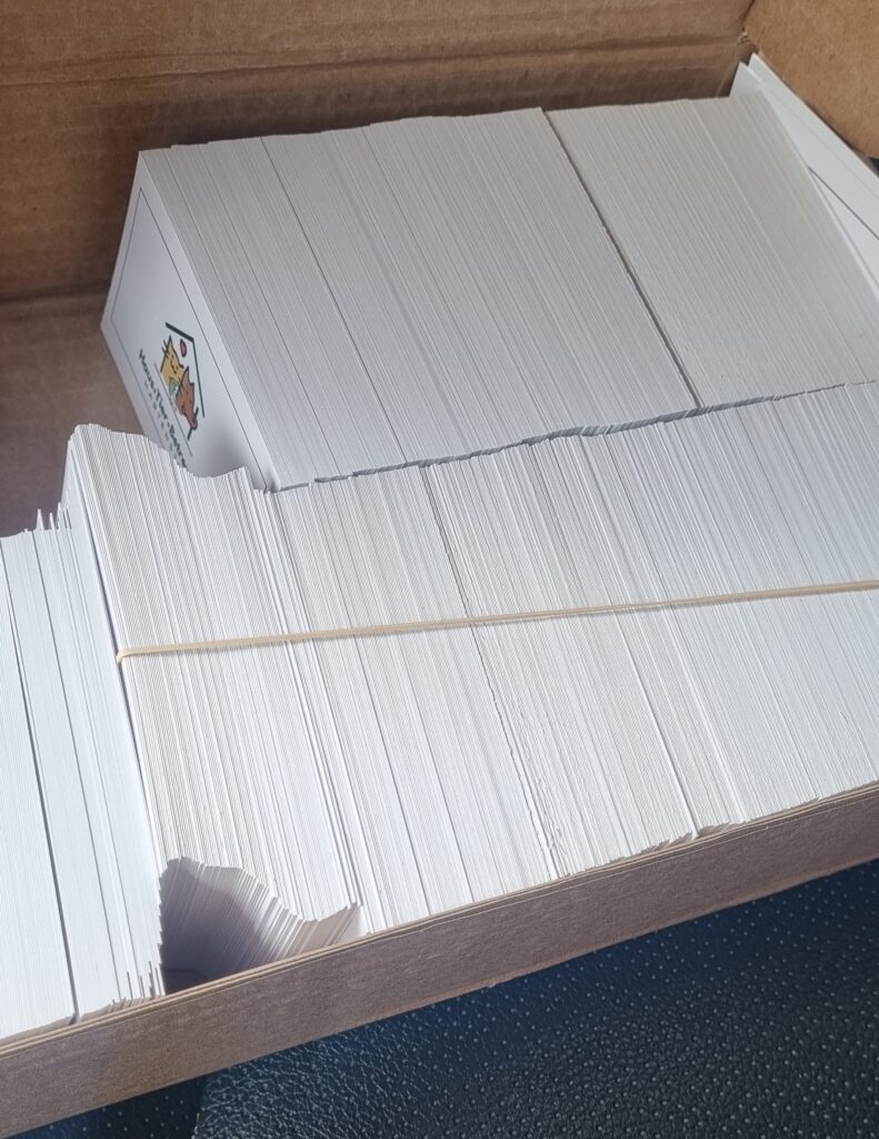 Visitenkarten in einem Karton